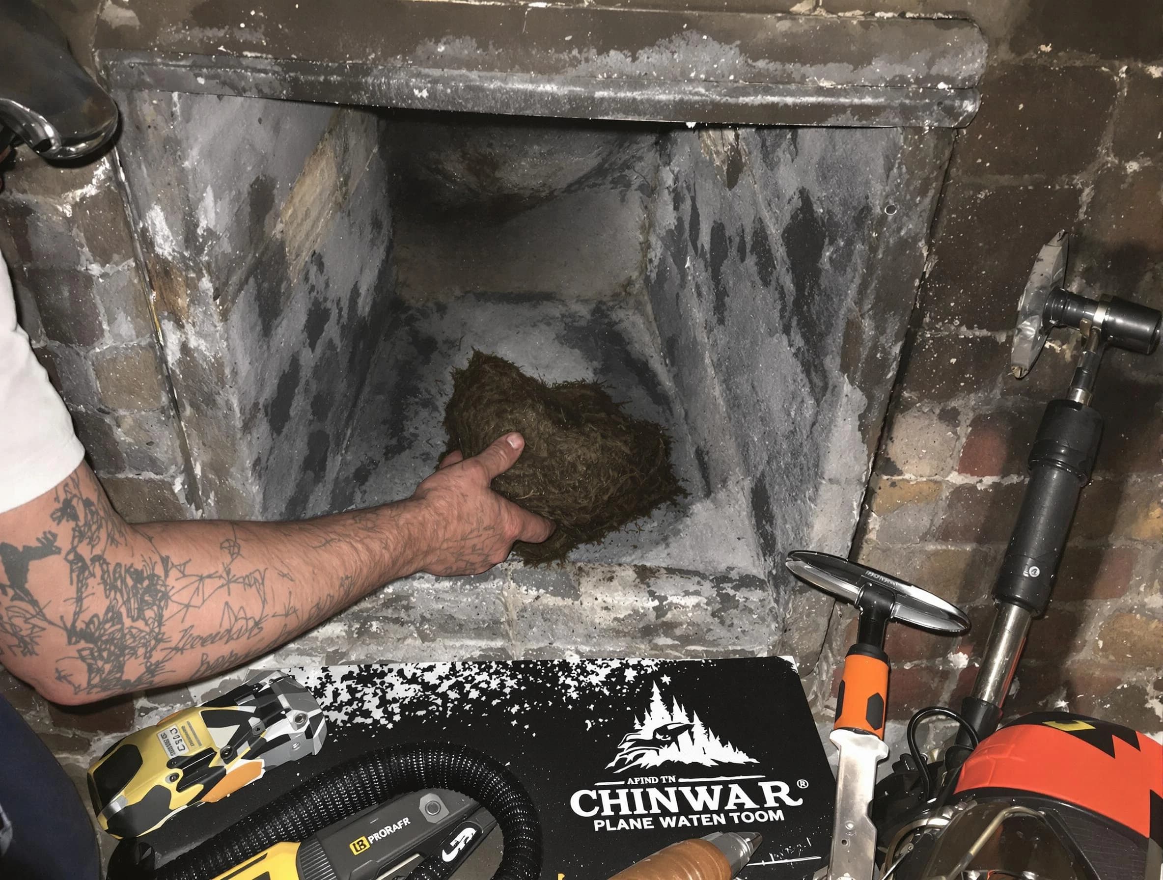 Nashville Chimney Sweep safely removing debris and screening chimney in Nashville, TN